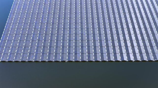 Aerial close-up view of floating solar panels on a lake in the Netherlands
