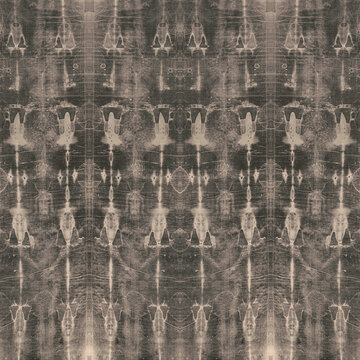 Symmetrical gothic damask pattern with eerie abstract faces and distressed sepia textures.