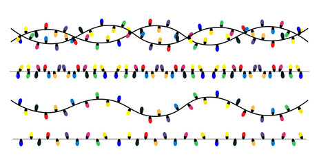 Obraz premium Colorful festive string lights arranged in decorative patterns during nighttime celebrations against a white background