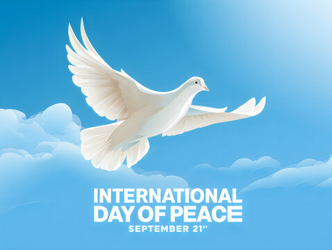 White dove flying in the blue sky for international day of peace on september 21