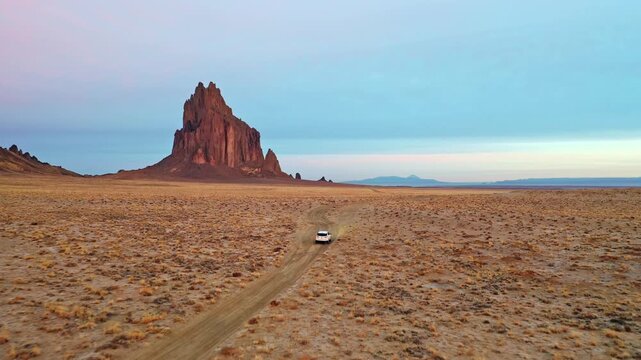 Aerial View of Car Driving Toward Shiprock in New Mexico
