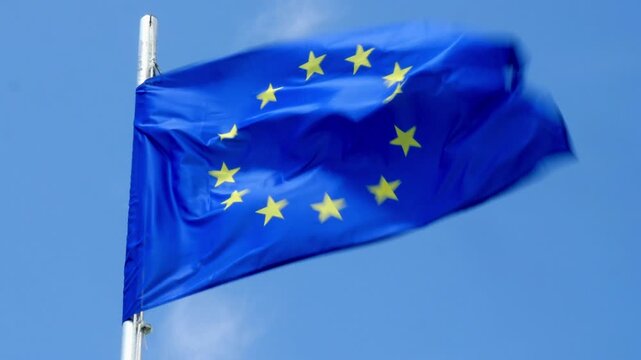 flag of european union wawing against clear sky 4k video