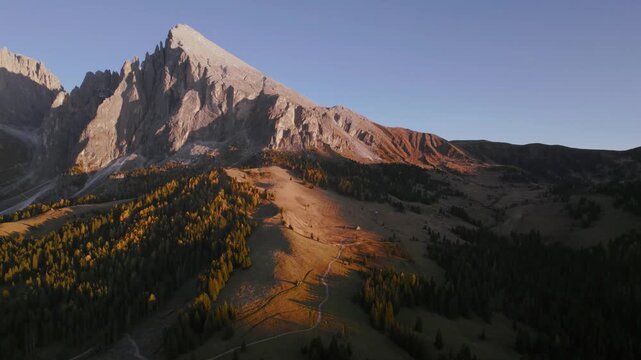 Aerial view od Sassolungo mountain in Dolomites, Italy at sunset