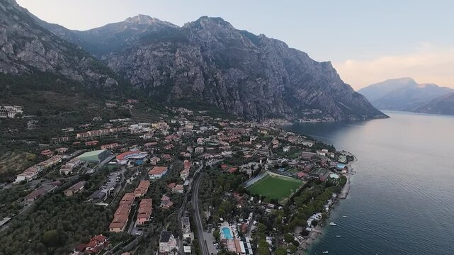 Spectacular Aerial View of Limone sul Garda on Lake Garda Surrounded by Italian Alps, Italy - 4k