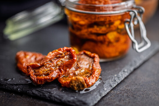 Sun-Dried Tomatoes in Jar With Olive Oil Preserved Gourmet Mediterranean Antipasto Close-Up