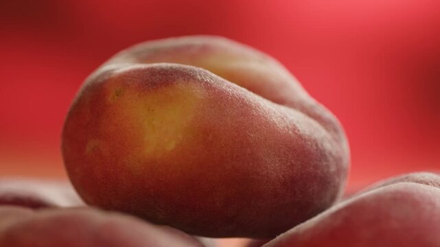 Chef cutting peach, apricot, nectarine and grapes with knife, preparing fruit salad for breakfast, homemade jam and juice