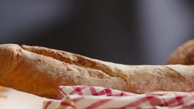 Bread assortment, mixed Spanish baguette loaves from Barcelona bakery, close-up macro shot showing crumb texture