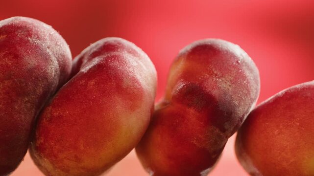 Chef cutting peach, apricot, nectarine and grapes with knife, preparing fruit salad for breakfast, homemade jam and juice