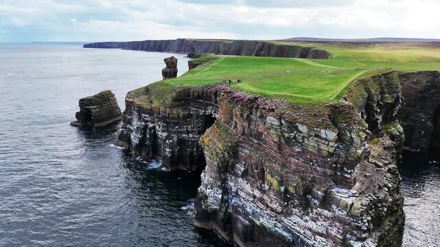 Aerial drone view of dramatic sea cliffs on the north coast of Scotland