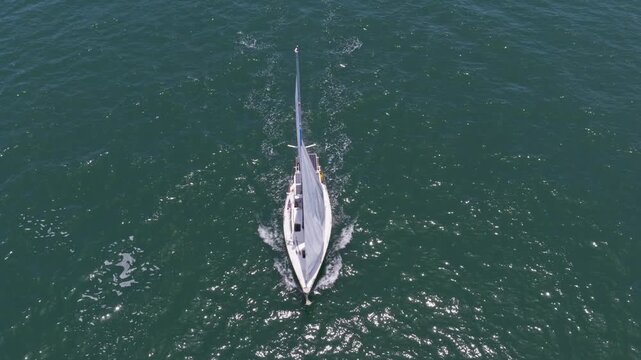 Vacation on summer. Yacht at sea. Motorboat yacht sailing at sea. Motorboat aerial top view. Luxury boat motor yacht at sea. Yachting boat tourism. Luxury lifestyle. White sails