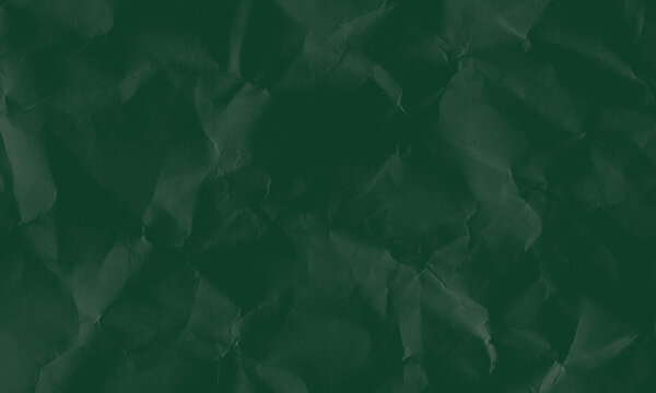Dark green crumpled paper texture background with visible creases and folds for creative designs Background