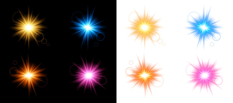 Set of glowing light effects with lens flares and starbursts in various colors