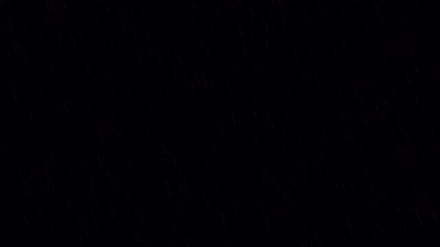 Falling rain animation with fine diagonal raindrops, atmospheric weather overlay footage with alpha channel for compositing and visual effects