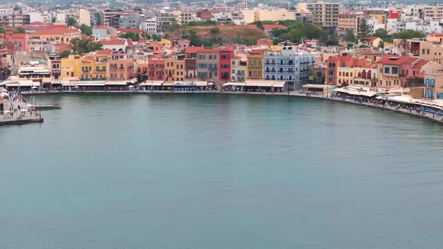 Beautiful Old city, Greece and best scenic places - panorama of picturesque old town Chania. Crete island, Panoramic of the old Venetian port and lighthouse during the blue hour, Travel Concepts