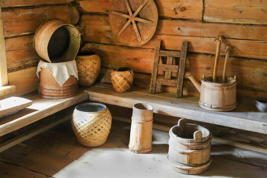 Objects of peasant life in a wooden hut. Household items, folk crafts. World tourism.