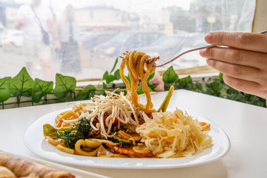 Thick Asian noodles with beef