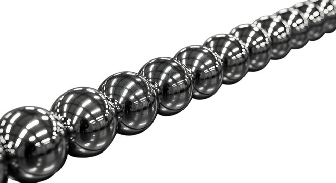 A row of shiny metal balls on a reflective surface
