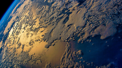 Blue Earth surface in the space. Solar system. Blue gradient. Space wallpaper. Elements of this image furnished by NASA © Trilly