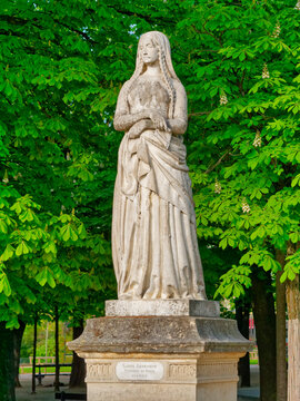 Sainte Genevi&egrave;ve statue (Saint Genevieve) one of the twenty marble statues of French queens and illustrious women in the public Jardin du Luxembourg (Luxembourg Garden), Paris