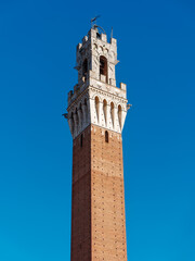 Fototapeta premium Mangia Tower ( translated Torre del Mangia) Bell tower Siena Tuscany Italy