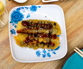 Sake age maki - fried salmon or tuna maki. Japan cuisine © JackF