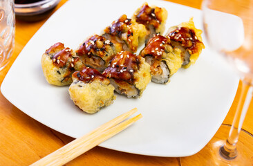 Sake age maki - fried salmon or tuna maki. Japan cuisine © JackF