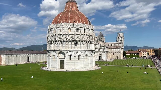 Leaning Tower of Pisa and Cathedral Piazza dei Miracoli,  from the medieval city walls on a sunny day panoramic high angle view.