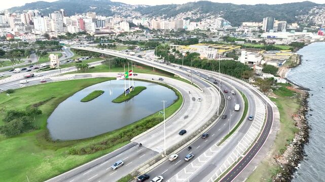 Florian&oacute;polis, Pedro Ivo Campos and Colombo Salles bridges. Aerial drone view of urban traffic and cityscape. Establishing shot.