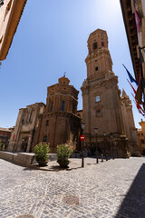 Fototapeta premium Roman Catholic cathedral with Romanesque and Gothic styles, featuring Portal of Last Judgement and Romanesque cloister