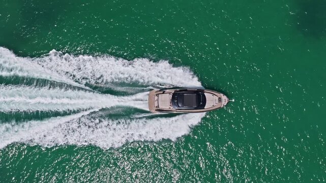 Luxury charter yacht in sea. Motor yacht luxury vessel. Boat motor yacht aerial. Motorboat tourism. Luxury boat yachting. Motorboat at sea. Vacation on summer. Coastal motorboat