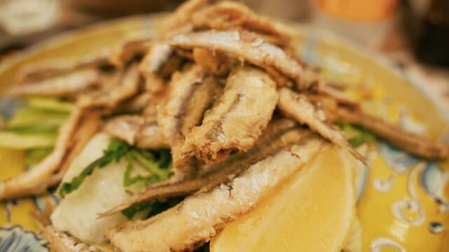Fried seafood at a restaurant outdoor in the street in Naples