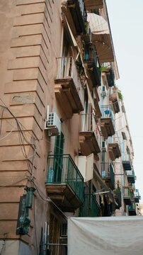 Historic buildings typical of Naples lining the streets