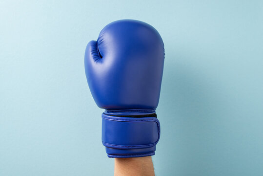 Blue boxing glove symbolizes men's health and ribbon awareness month campaign