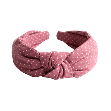 Dusty rose knotted headband with white polka dots isolated on transparent background