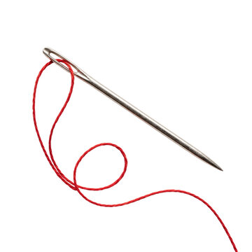 Close-up of a sewing needle with red thread looped through its eye