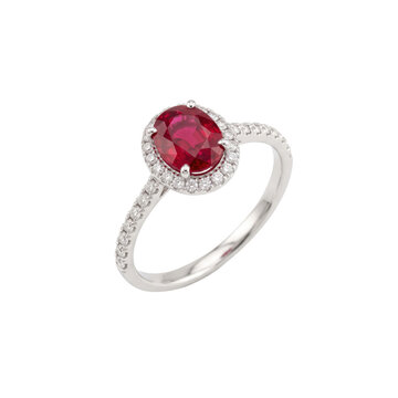 Elegant oval ruby and diamond halo ring in white gold