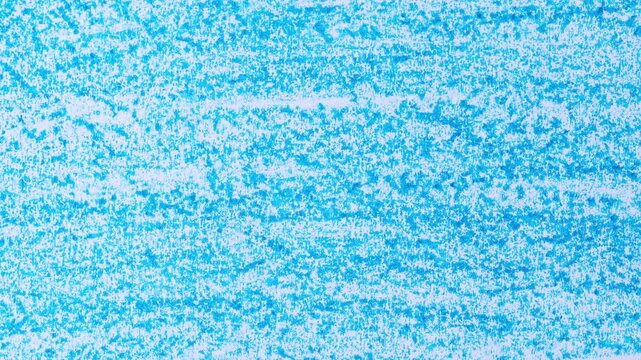 Scribbles and rubbing marks made with a blue wax