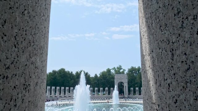 Travel and Landmarks: Close Up View of Water Jets in Rainbow Pool Fountain at National World War II Memorial in Washington DC