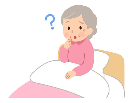 ベッドに座る高齢女性　話す　疑問　表情