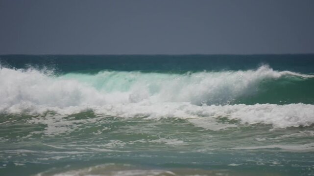 perfect surfing waves in Huntington beach