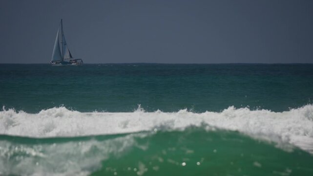 slow motion white water waves moving to the shore
