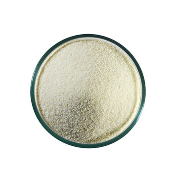 raw semolina flour known in India as rava flour, soji, or sooji in glass bowl, use in famous Indian Gujarati traditional foods and sweet, top view,  cutout in transparent background, png format