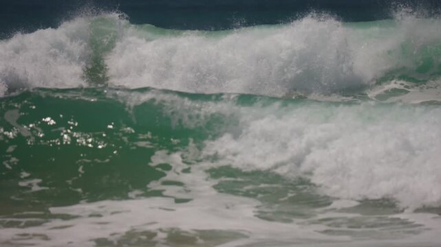 Waves breaking on a perfect beach day