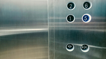 Modern Elevator Control Panel with Floor Selection Buttons and Copy Space © Mochammad