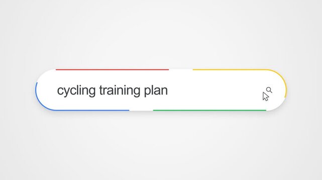 Close-up view of typing "cycling training plan" into an online search bar with a cursor clicking the search icon, illustrating internet search and bicycle fitness research