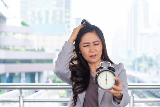 Outdoor, business and hurry with watch for time, morning commute urgent deadline