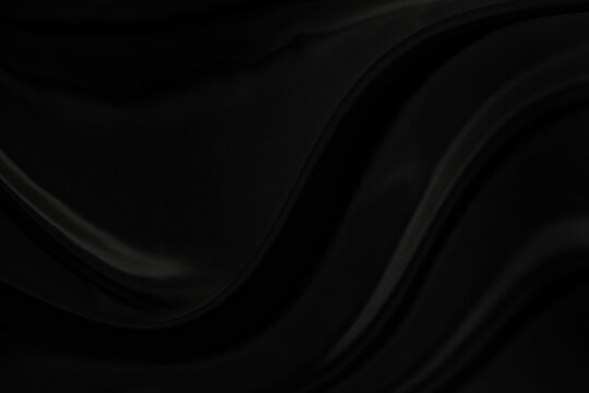 Black gray satin dark fabric texture luxurious shiny that is abstract silk cloth background with patterns soft waves blur beautiful.