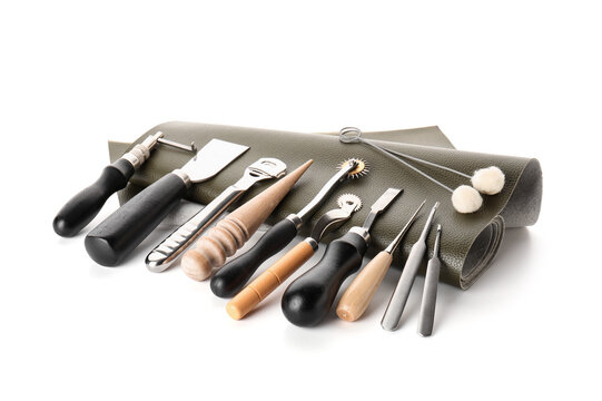 Leather crafting tools and supplies, handmade artisan workshop equipment, hobby and DIY leatherwork on white background