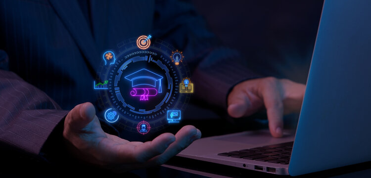 Businessman using laptop computer while open hand supporting glowing graduation cap education circle nodes. E-learning academic qualification, student degree, and university knowledge concept.