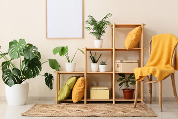 Biophilic design and indoor gardening cozy home interior with various potted plants wooden shelf and natural decoration © Pixel-Shot
